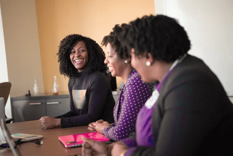 women at a meeting